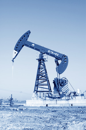 CAOFEIDIAN - DECEMBER 1: The crank balanced beam pumping unit in the JiDong oilfield, on December 1, 2013, caofeidian, hebei province, China. のeditorial素材