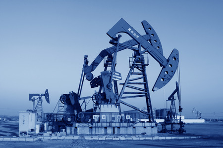 CAOFEIDIAN - DECEMBER 1: The crank balanced beam pumping unit in the JiDong oilfield, on December 1, 2013, caofeidian, hebei province, China. のeditorial素材
