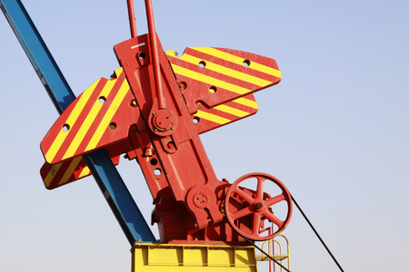 CAOFEIDIAN - DECEMBER 1: The crank balanced beam pumping unit in the JiDong oilfield, on December 1, 2013, caofeidian, hebei province, China. のeditorial素材