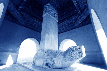 The huge stone turtle carrying a stone huge tablet, in the Eastern Tombs of the Qing Dynasty, on december 15, 2013, ZunHua, hebei province, China. のeditorial素材