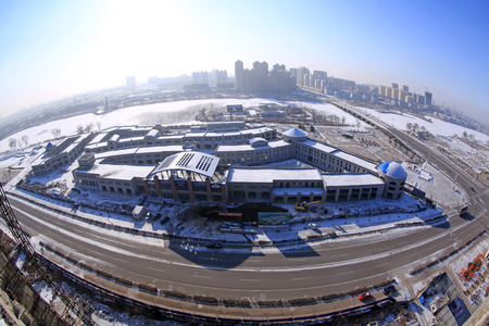 Unfinished building site after a snow, closeup of photo, chinaのeditorial素材