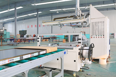 TANGSHAN - DECEMBER 22: The Machinery and equipment in the workshop, in a solar equipment...