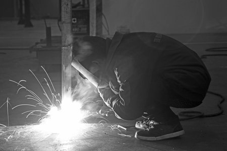 welders in a manufacturing factory