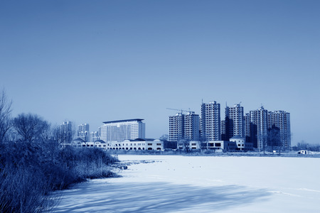 Unfinished high-rise buildings in the snow on december 18, 2013, Luannan county, hebei province, China のeditorial素材