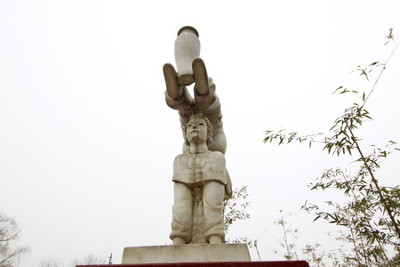 CANGZHOU - DECEMBER 8: The acrobatic characters carved stone works, in the WuQiao acrobatics world scenic spots, on december 8, 2013, cangzhou, hebei province, China. のeditorial素材