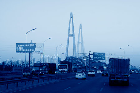 TIANJIN - DECEMBER 9: The vehicles in the haihe river bridge, on December 9, 2013, tianjin, China. のeditorial素材