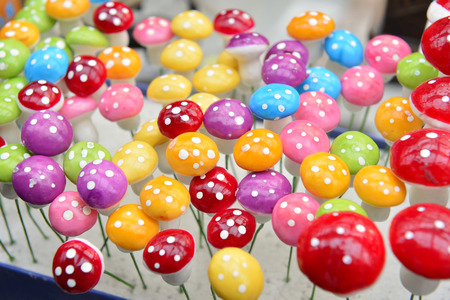 colorful mushrooms ornaments in a shop, closeup of photoの写真素材