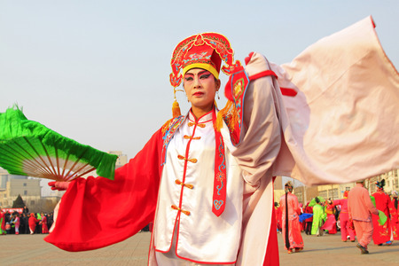 LUANNAN COUNTY - FEBRUARY 12: People wearing colorful clothes, performing yangko dance in the street, during the Chinese Lunar New Year, February 12, 2014, Luannan County, Hebei Province, China.
のeditorial素材