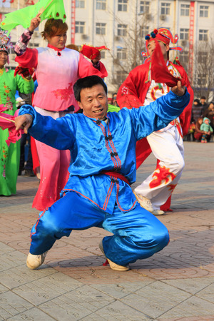 LUANNAN COUNTY - FEBRUARY 8: People wearing colorful clothes, performing yangko dance in the street, during the Chinese Lunar New Year, February 8, 2014, Luannan County, Hebei Province, China.
のeditorial素材