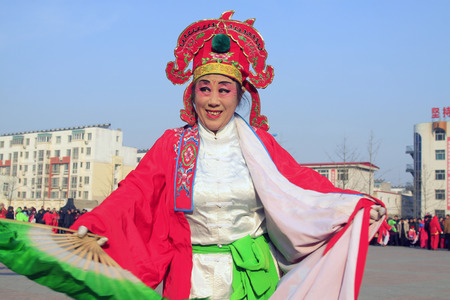 LUANNAN COUNTY - FEBRUARY 11: People wearing colorful clothes, performing yangko dance in the street, during the Chinese Lunar New Year, February 11, 2014, Luannan County, Hebei Province, China.
のeditorial素材