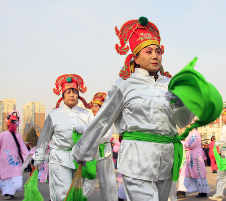 LUANNAN COUNTY - FEBRUARY 11: People wearing colorful clothes, performing yangko dance in the street, during the Chinese Lunar New Year, February 11, 2014, Luannan County, Hebei Province, China.
のeditorial素材