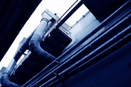 material pipe wrapped in thermal insulation in a factory