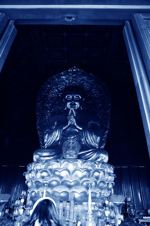 BEIJING - DECEMBER 22: The golden Buddha in the Wanchun Pavilion of the Jingshan Park, December 22, 2013, Beijing, China. 
のeditorial素材
