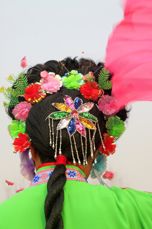 women head decoration in yangko, during the Chinese Lunar New Year, Luannan County, Hebei Province, China.
  の写真素材