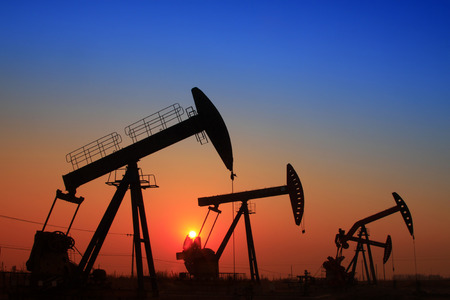 CAOFEIDIAN - DECEMBER 1: The crank balanced beam pumping unit under the curtain of night in the JiDong oilfield, on December 1, 2013, caofeidian, hebei province, China. 
のeditorial素材