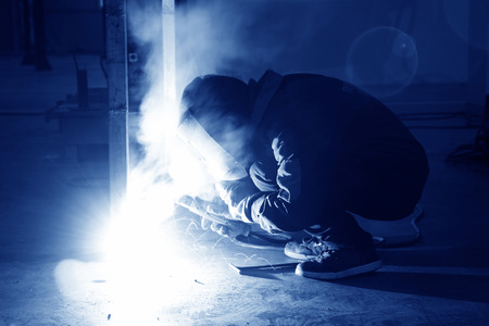welders in a manufacturing factory, closeup of photoの写真素材