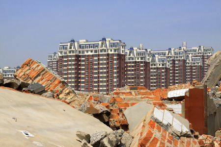 LUANNAN COUNTY - APRIL 6: Housing demolition materials in the demolition site and new building, April 6, 2014, Luannan county, hebei province, China. のeditorial素材
