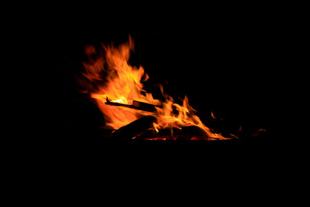 flame burning in the night, closeup of photo