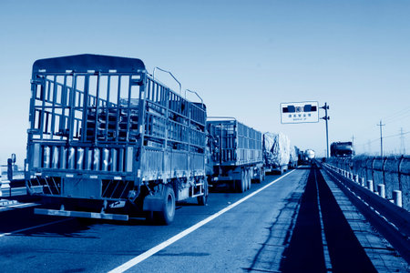 TIANJIN - DECEMBER 9: The heavy duty trucks were stopped on the highway Because of the traffic jam, on December 9, 2013, tianjin, China. のeditorial素材