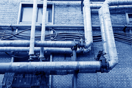material pipe wrapped in thermal insulation in a factoryの写真素材