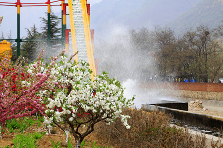 PINGGU COUNTY - APRIL 12: Mass water sports entertainment - surging ahead, in the stone forest canyon scenic spot, April 5, 2014, Pinggu county, beijing, China. のeditorial素材