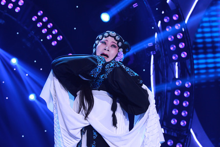 LUANNAN COUNTY - JANUARY 6: The PingJu Qin Xianglian image on the stage, in the ChengZhaoCai grand theater, January 6, 2014,luannan county, hebei province, china.
のeditorial素材