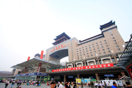 BEIJING - MAY 21: Pedestrians outside the Beijing west railway station, on may 21, 2014, Beijing, Chinaのeditorial素材