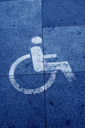 disabled people pass sign on the ground, closeup of photoの写真素材