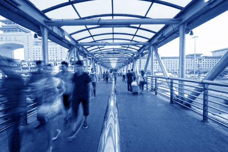 Pedestrians on the flyover near the Beijing west railway station, Beijing, Chinaのeditorial素材