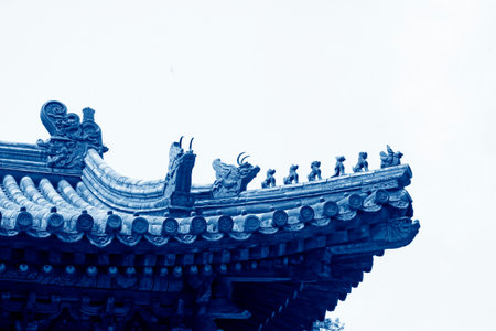 traditional Chinese style glazed tile eaves, closeup of photoの写真素材