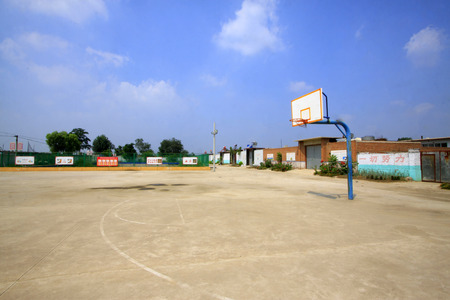 LUANNAN COUNTY - AUGUST 15: basketball frame on the playground in a rural school, on august 15, 2014, Luannan County, Hebei Province, China 
のeditorial素材