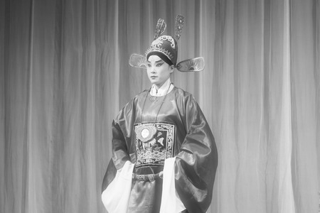 LUANNAN COUNTY - NOVEMBER 25: The ancient costume PingJu " QianKun-Fu-Shou Mirror" still in the ChengZhaoCai grand theater, on november 28, 2013, luannan county, hebei province, china.のeditorial素材