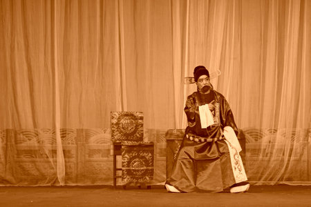LUANNAN COUNTY - NOVEMBER 25: The ancient costume PingJu " QianKun-Fu-Shou Mirror" still in the ChengZhaoCai grand theater, on november 28, 2013, luannan county, hebei province, china.のeditorial素材