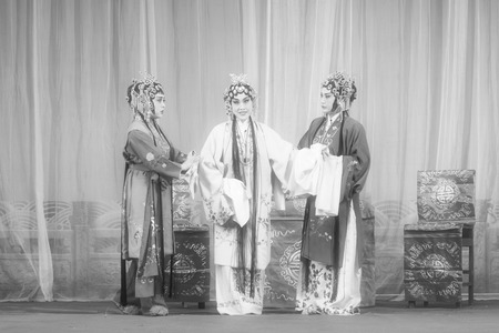 LUANNAN COUNTY - NOVEMBER 25: The ancient costume PingJu " QianKun-Fu-Shou Mirror" still in the ChengZhaoCai grand theater, on november 28, 2013, luannan county, hebei province, china.のeditorial素材