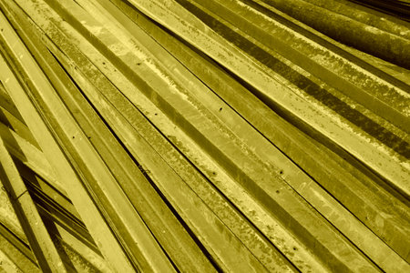 oxidation rusty angle iron piling up in togetherの写真素材