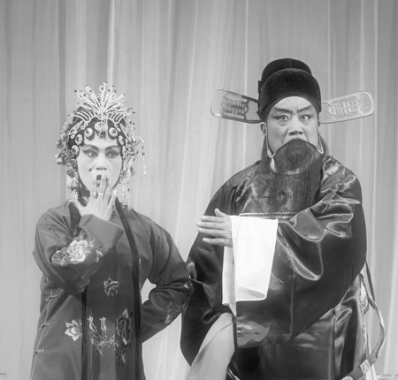 LUANNAN COUNTY - NOVEMBER 25: The ancient costume PingJu " QianKun-Fu-Shou Mirror" still in the ChengZhaoCai grand theater, on november 28, 2013, luannan county, hebei province, china.のeditorial素材