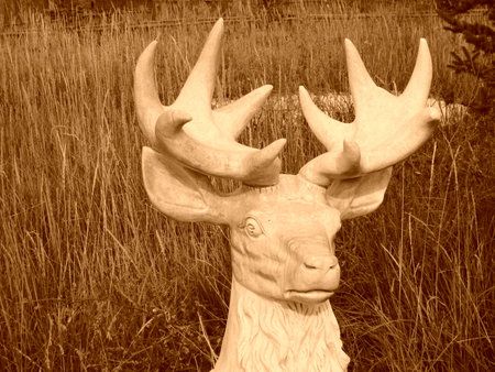 FENGNING COUNTY - AUGUST 20: male deer sculpture in a park, on august 20, 2014, Fengning County, Hebei Province, China のeditorial素材