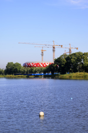 LUANNAN COUNTY - SEPTEMBER 3: red buildings and tower crane at a construction site, on september 3, 2014, Luannan County, Hebei Province, China 
のeditorial素材