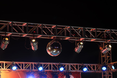 stage light on the metal frame in the darkの写真素材