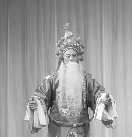 LUANNAN COUNTY - NOVEMBER 25: The ancient costume PingJu " QianKun-Fu-Shou Mirror" still in the ChengZhaoCai grand theater, on november 28, 2013, luannan county, hebei province, china.のeditorial素材