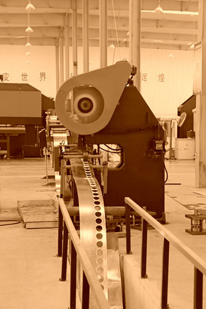 TANGSHAN - DECEMBER 22: The transmission device on the production line, in a solar equipment production workshop on december 22, 2013, tangshan, china.のeditorial素材