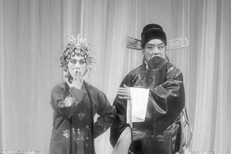 LUANNAN COUNTY - NOVEMBER 25: The ancient costume PingJu " QianKun-Fu-Shou Mirror" still in the ChengZhaoCai grand theater, on november 28, 2013, luannan county, hebei province, china.のeditorial素材