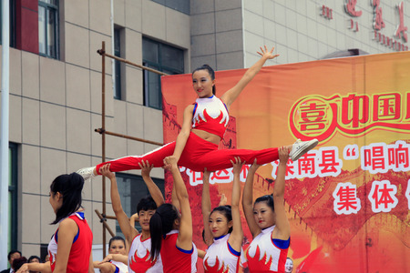 LUANNAN COUNTY - SEPTEMBER 27: dance performance at the National Day party, on september 27, 2014, Luannan County, Hebei Province, Chinaのeditorial素材
