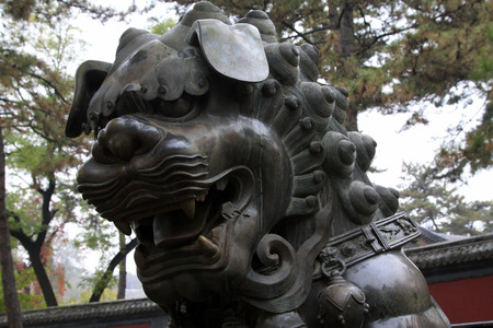 CHENGDE CITY -  OCTOBER 20: Bronze lion sculpture in chengde mountain resort, on october 20, 2014, Chengde City, Hebei Province, Chinaのeditorial素材