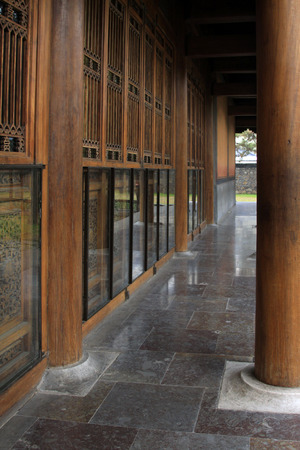 Chinese traditional style wooden windows lattice and column, closeup photoのeditorial素材