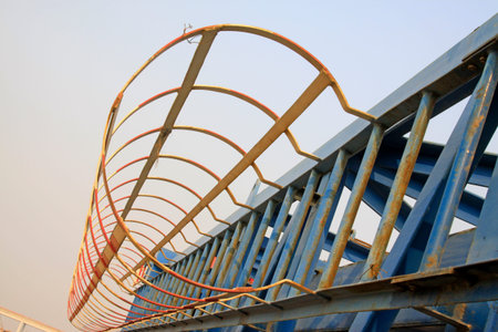 Metal ladders and fence, closeup of photo