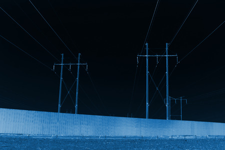 high voltage transmission line under sky, north chinaの写真素材