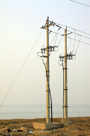 telegraph poles in the desert, closeup of photoのeditorial素材