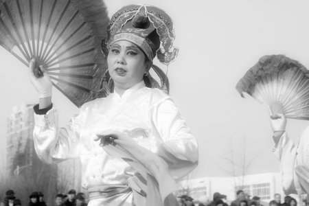 LUANNAN COUNTY - FEBRUARY 11: People wearing colorful clothes, performing yangko dance in the...