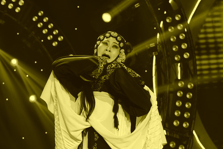 LUANNAN COUNTY - JANUARY 6: The PingJu Qin Xianglian image on the stage, in the ChengZhaoCai grand theater, January 6, 2014,luannan county, hebei province, china.のeditorial素材